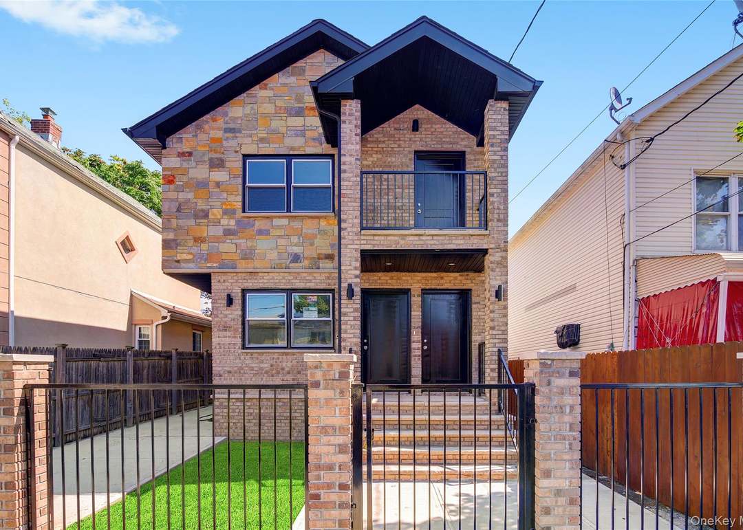 Two-Family Townhouse — Investment Opportunity